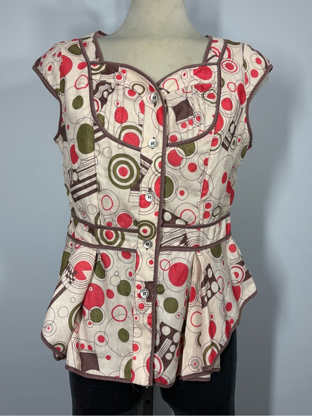 Cap-Sleeve Peplum Button-Front Top in Cream with Red & Olive Circles